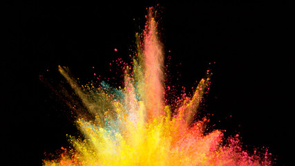 Multi-color powder explosion on black background