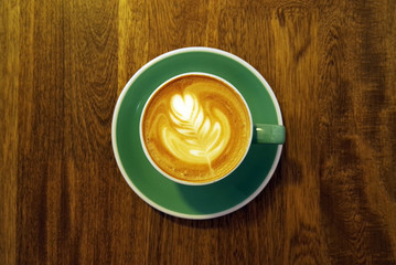 Coffee cup on wooden table