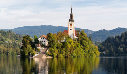 Church of the assumption of Mary in the island of Bled lake, Slovenia, with reflects in the water