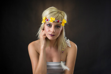 Naklejka premium portrait of beautiful young woman wearing hippie headband
