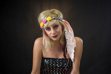 portrait of beautiful young woman wearing hippie headband