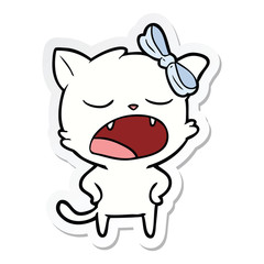 sticker of a cartoon yawning cat