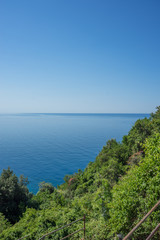 Fototapeta na wymiar Italy, Cinque Terre, Corniglia, a large body of water