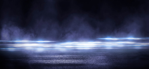 Wet asphalt, reflection of neon lights, a searchlight, smoke. Abstract light in a dark empty street with smoke, smog. Dark background scene of empty street, night view, night city.