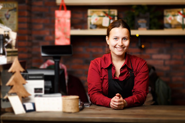 Picture of brunette seller in store