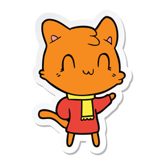 sticker of a cartoon happy cat wearing scarf