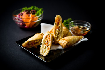 Thai food. Spring rolls with vegetables and sweet and sour sauce