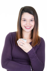 happy young woman holding a cup of tea