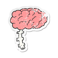 retro distressed sticker of a cartoon brain