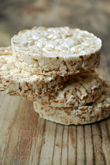 Round rice cakes on wooden table