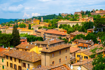 Naklejka premium Perugia, Italy - Panoramic view of the Perugia historic quarter with medieval houses and Umbria valleys and mountains in background