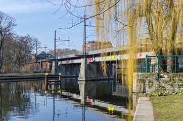 Banks of the river Spree with the steel railway bridge Bellevue in Berlin, Germany