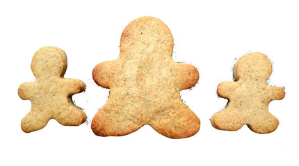 Gingerbread cookies in shape of man on wooden table