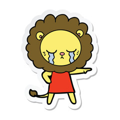 sticker of a crying cartoon lion