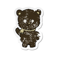retro distressed sticker of a cute cartoon black bear waving