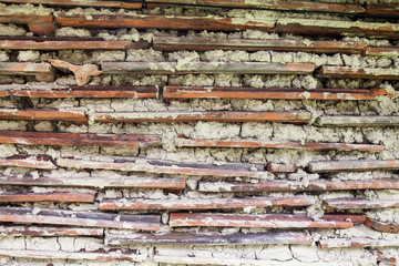 Wall constructed of roof tiles
