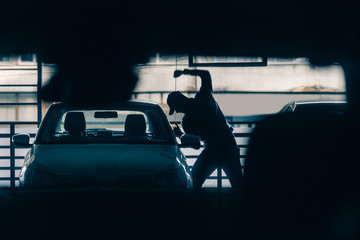 Fototapeta premium Bandit stealing a car