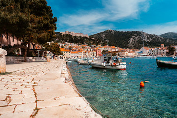 Moored yachts stand in the port town