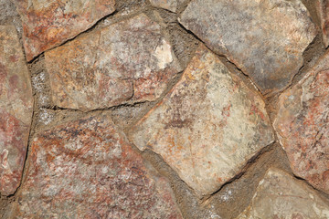 Flat stones forming natural beautiful brown texture