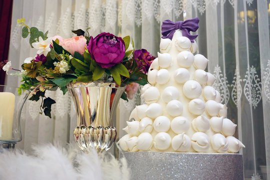 Engagement catering concept with ornaments candles cake and chocolate