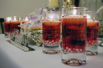 Engagement catering concept with ornaments candles cake and chocolate