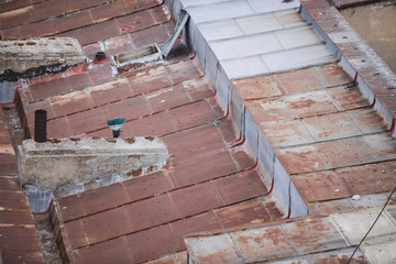 Rusty metal roof on a neglected building