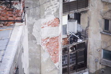 Inhabited, old and decayed (almost ruined) building