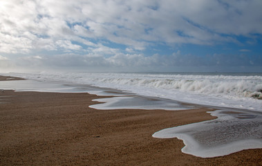 Pacific ocean wave tidal overflowing into Santa Clara river estuary at Ventura California United...