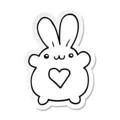 sticker of a cute cartoon rabbit with love heart
