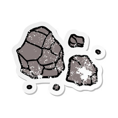 distressed sticker of a cartoon rocks