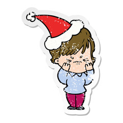 distressed sticker cartoon of a frustrated woman wearing santa hat