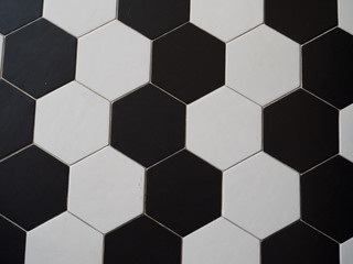 Black and white floor with hexagonal geometric shape