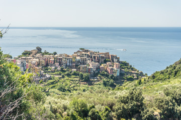 Fototapeta na wymiar Italy, Cinque Terre, Corniglia, HIGH ANGLE VIEW OF BUILDINGS AND SEA AGAINST SKY