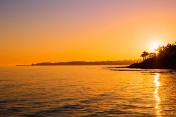 Fototapeta na wymiar Sunset landscape. View of Puerto Banus, Marbella.