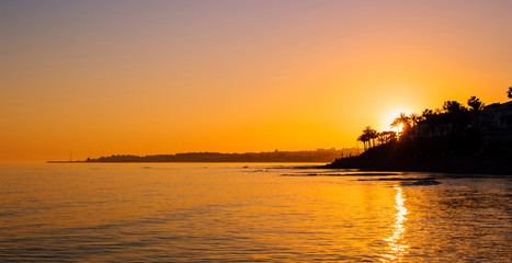 Fototapeta premium Sunset landscape. View of Puerto Banus, Marbella.