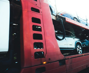 Side view of car truck transporting multiple cars