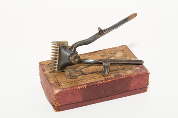  Vintage rusty hair clipper isolated on white. Old trimmer isolated 