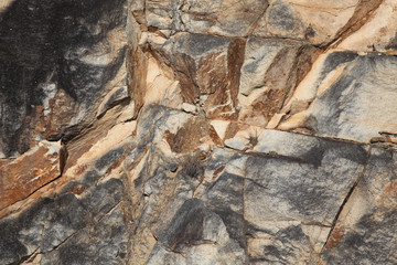 Huge natural stone with hard surface close-up texture