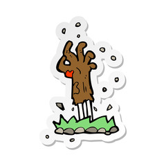 sticker of a cartoon zombie hand rising from ground
