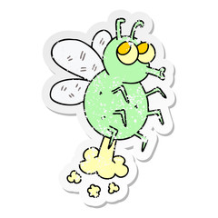 distressed sticker of a quirky hand drawn cartoon fly
