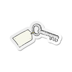 retro distressed sticker of a cartoon key with tag