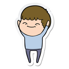 sticker of a cartoon smiling boy