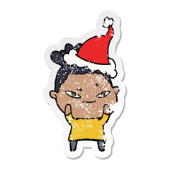 distressed sticker cartoon of a woman wearing santa hat