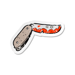 retro distressed sticker of a cartoon bloody folding knife