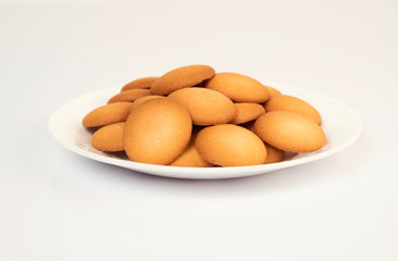 Many cookies on a white plate