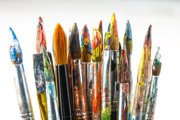 Paint brushes and paints for drawing.
