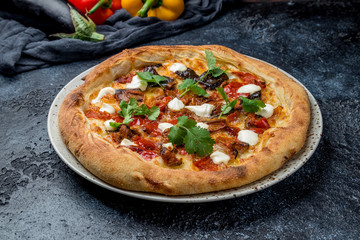 Pizza with meat and eggplant