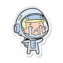 sticker of a cartoon crying astronaut
