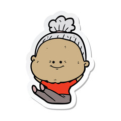 sticker of a cartoon happy old woman