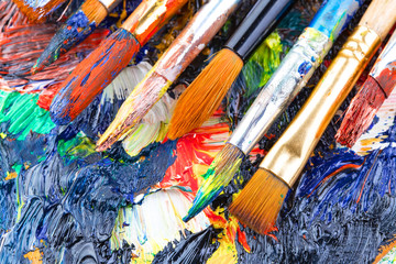 Obraz premium Paint brushes and paints for drawing.